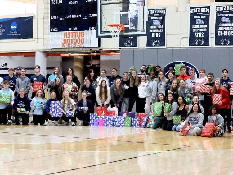 Penn State Abington student athletes wrapped gift for a family in need